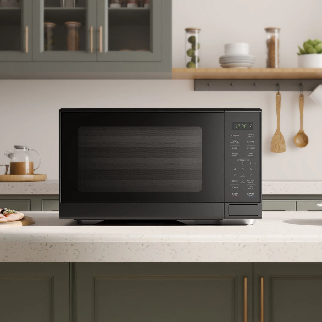 Mainstays 1.1 Cu. ft Microwave Oven in Black - image 4