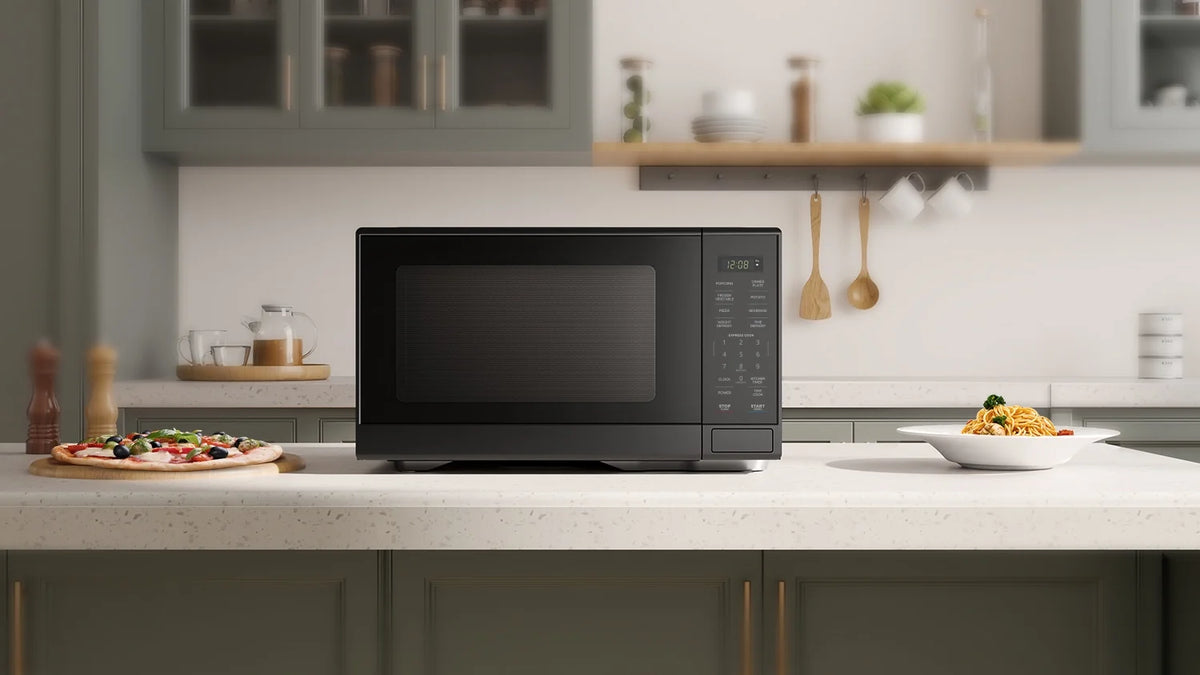 Mainstays 1.1 cu ft Microwave Oven in Black - image 4