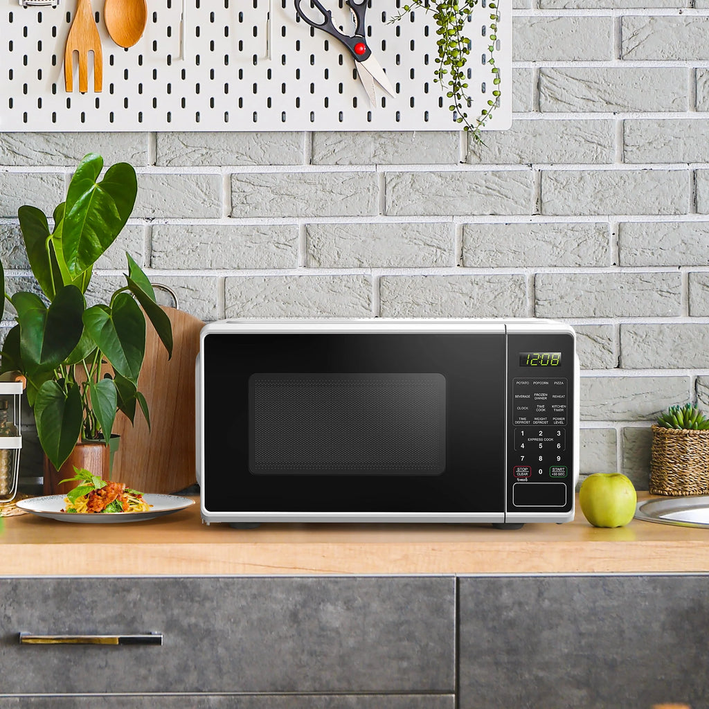 Mainstays 0.7 Cu. Ft. Countertop Microwave Oven, 700 Watts, White, New - image 9